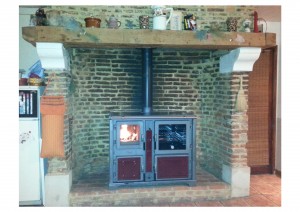 Installation d'un poêle (cuisinière) dans cheminée à foyer ouvert (installation et tubage) en Eure (Normandie)